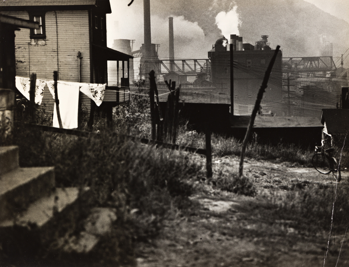 WALKER EVANS (1903-1975) Houses near a steel mill (Bethlehem, PA).